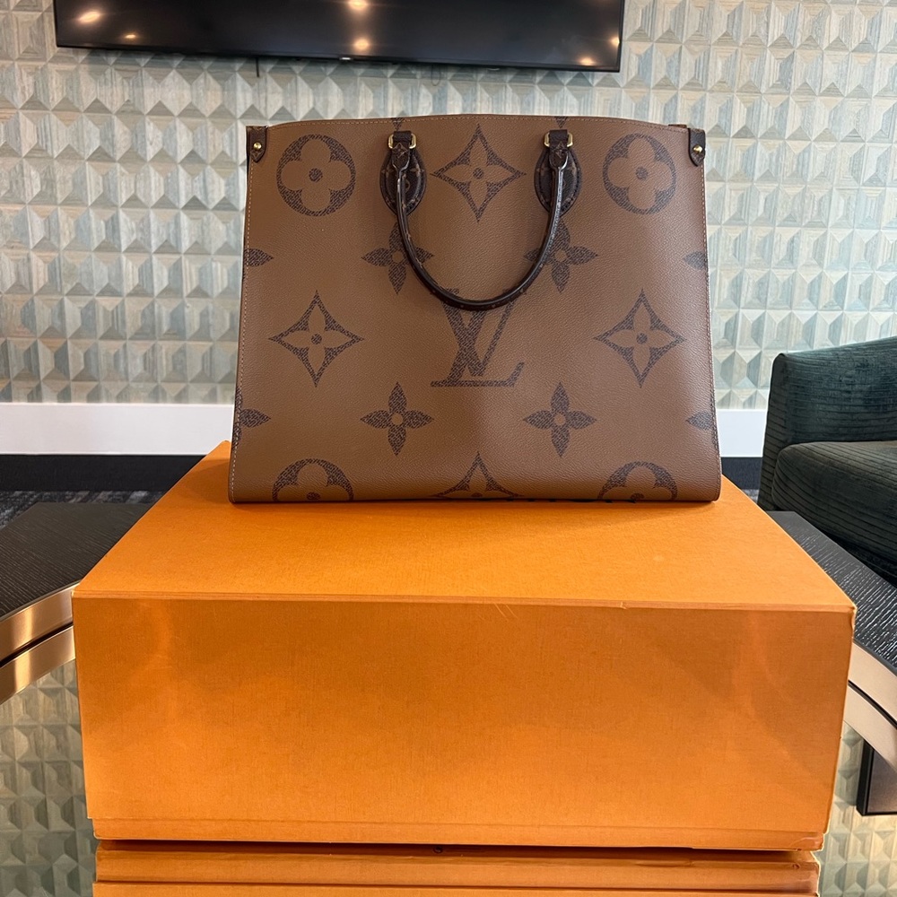 Gently used: Few Light scratches Louis Vuitton On The-Go MM Monogram Reverse